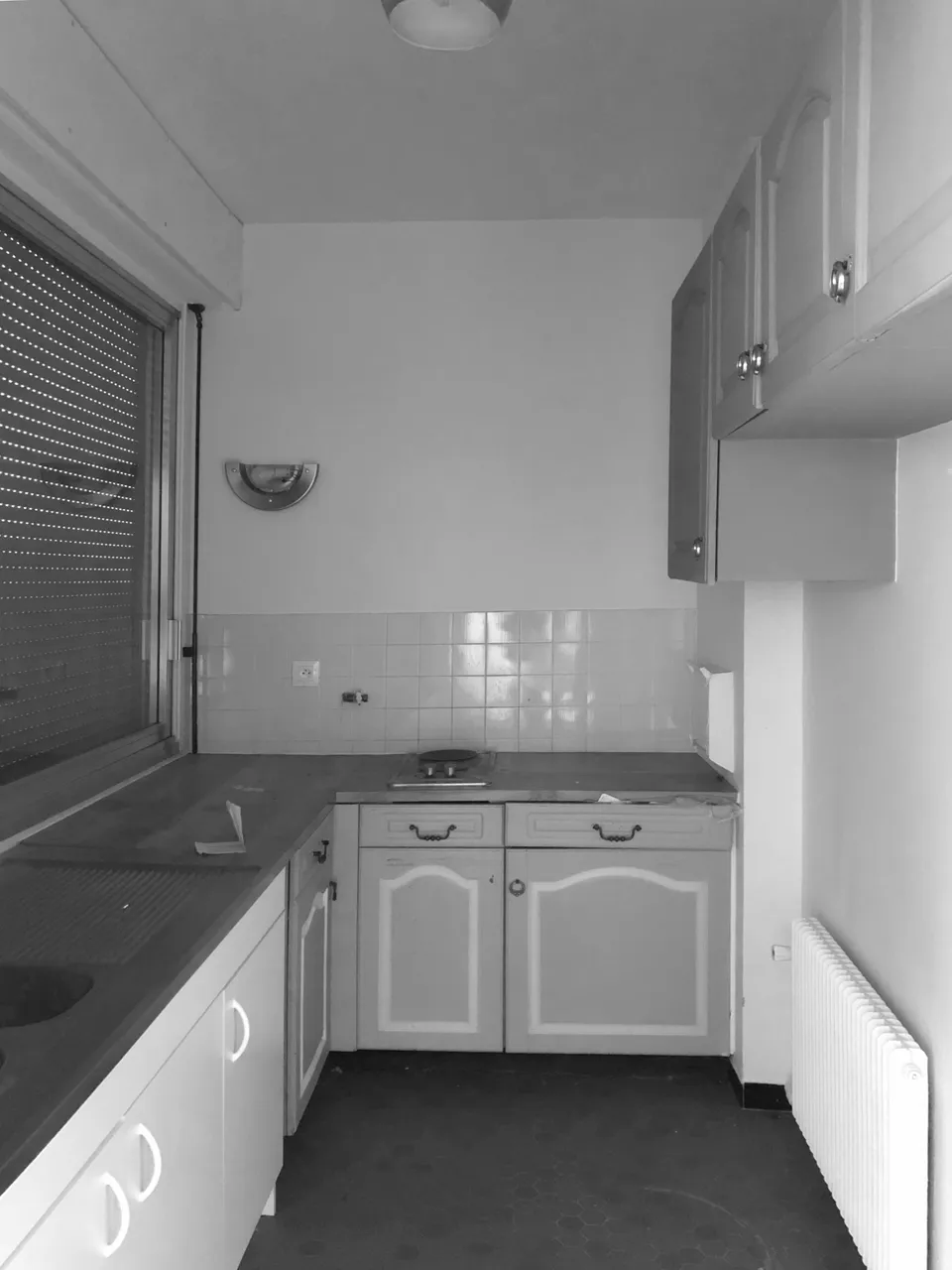 Studio Madame : architecte d’intérieur, Paris et Montmorency
Projet réalisé à Montmorency.
Photographie d’intérieur (noir et blanc) : cuisine d’un appartement avant intervention.